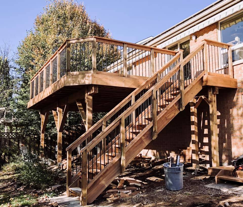 Backyard deck with stairs construction